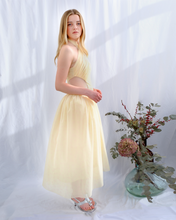 Soft Drop: Yellow pannier dress