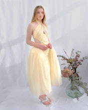 Soft Drop: Yellow pannier dress